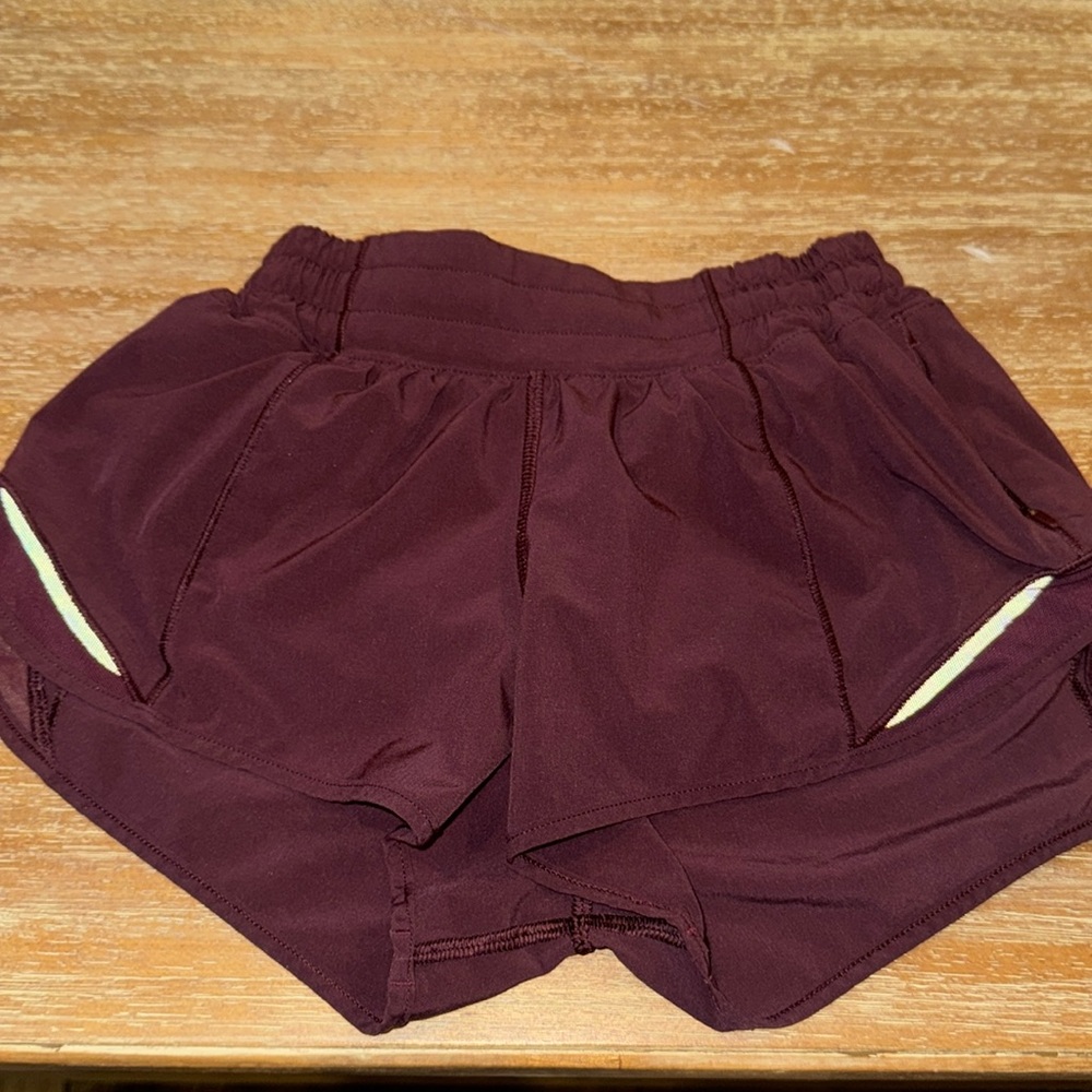 Size 2 lululemon maroon hotty hot 2.5” shorts